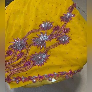 Yellow Embroidered saree with Pink and Silver Accents